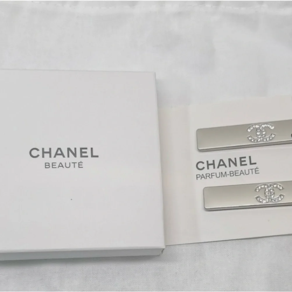 CHANEL Silver Hair Clips with Crystal Logo - Picture 3 of 9
